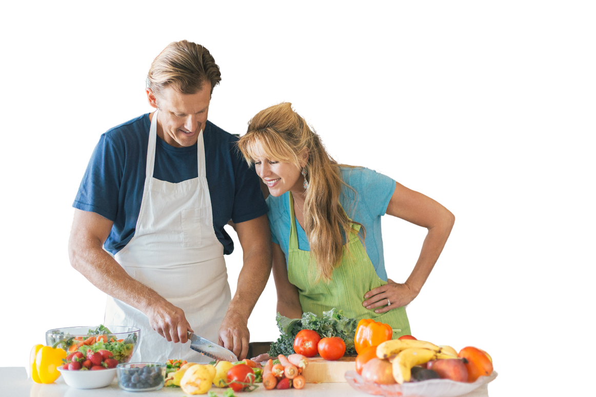 Husband and wife cooking together